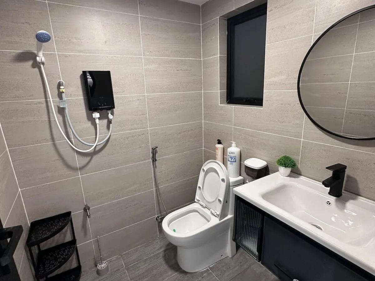 Modern full bathroom with hot shower and bidet