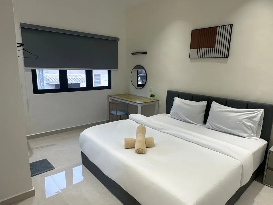 Bedroom 1 at Landak Kawan Fun House, view 1