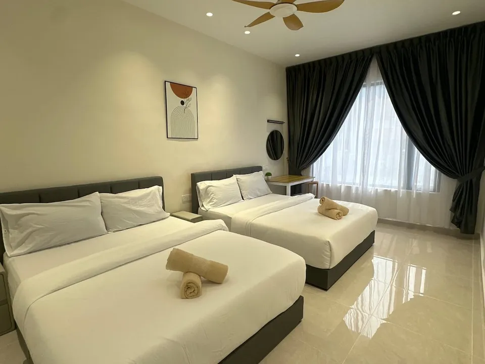 Bedroom 2 at Landak Kawan Fun House, view 1