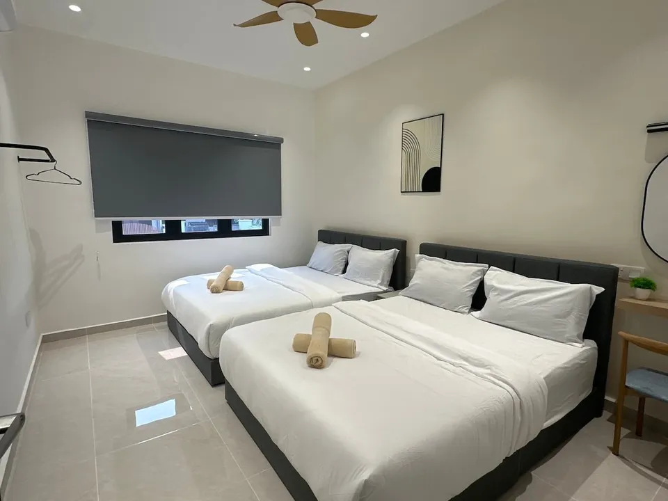 Bedroom 3 at Landak Kawan Fun House, view 1