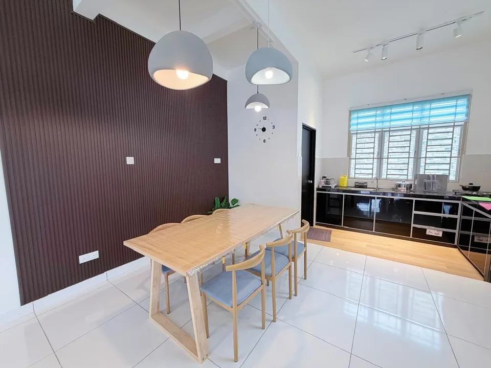 Dining room with a large table set for family-style meals