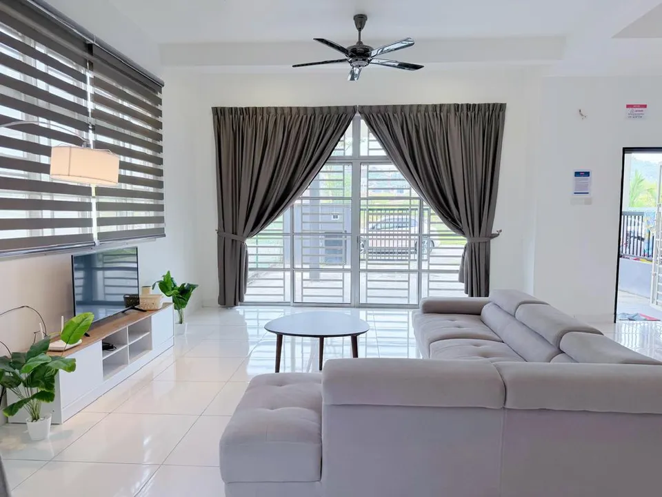 Living room with a comfortable sofa set arranged around a coffee table