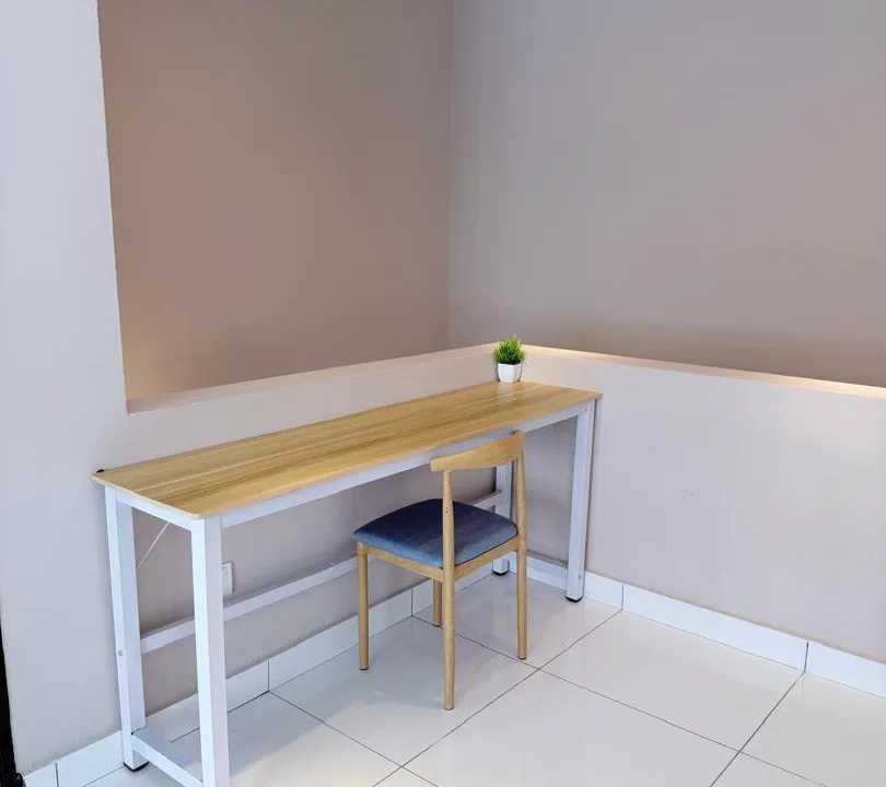 Study corner with a desk and chair set up for focused work